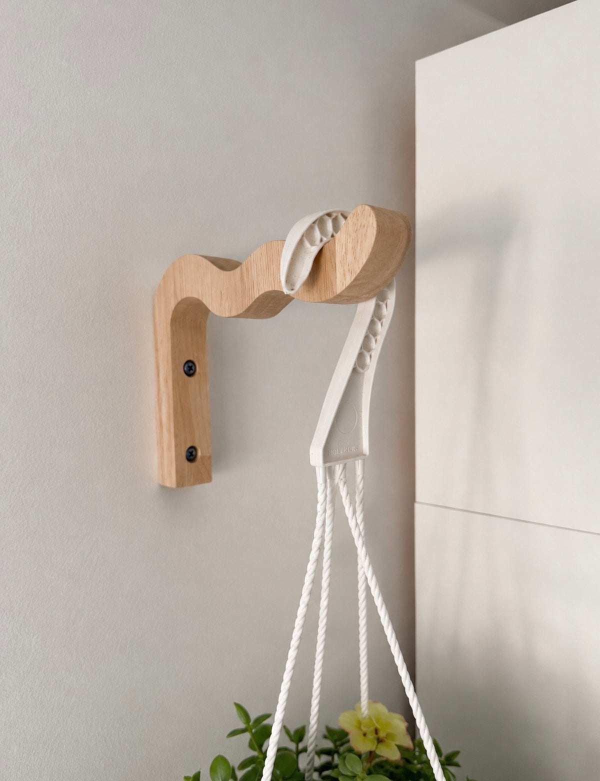 Support mural en bois ondulé pour plantes suspendues